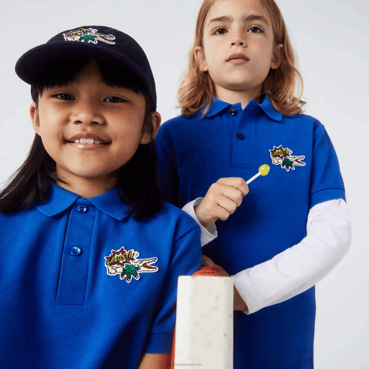 crianças Lacoste azul k1q polo em piquê de algodão orgânico com distintivo cômico 08D03145