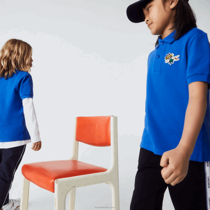 crianças Lacoste azul k1q polo em piquê de algodão orgânico com distintivo cômico 08D03145