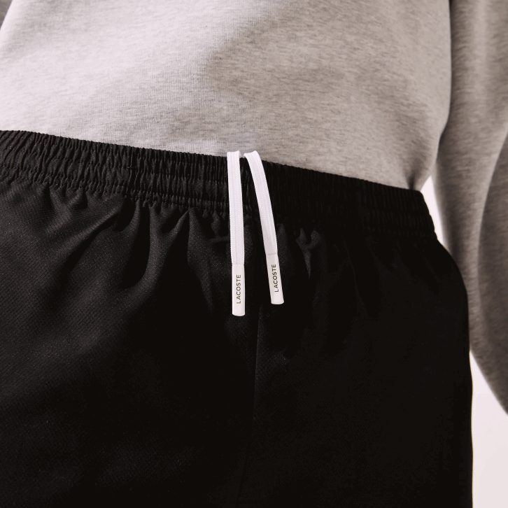 homens Lacoste preto 031 calças esportivas de tecido leve 08D0550