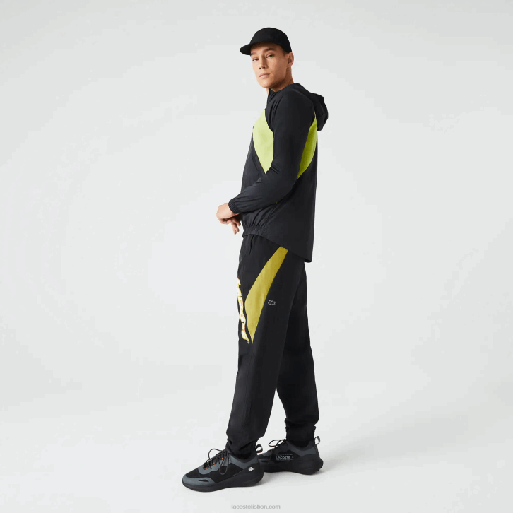 homens Lacoste preto amarelo n07 Calça esportiva com blocos de cores de ajuste regular Heritage 08D01110