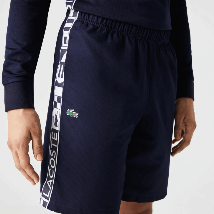homens Lacoste azul marinho 166 shorts de tênis esportivos de tafetá 08D01334