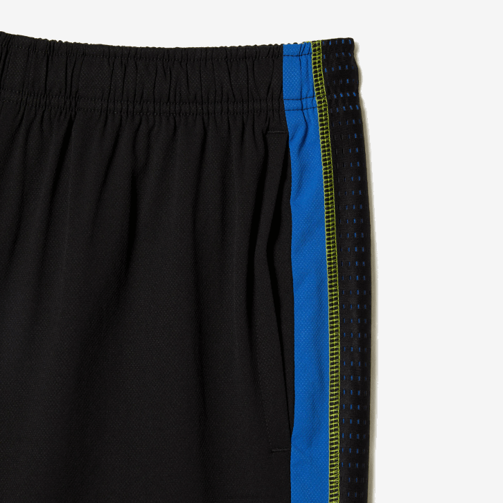 homens Lacoste preto azul amarelo xis shorts de tênis de poliéster reciclado 08D0425